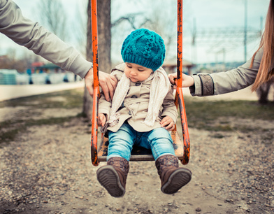 Sad child in playground after divorce