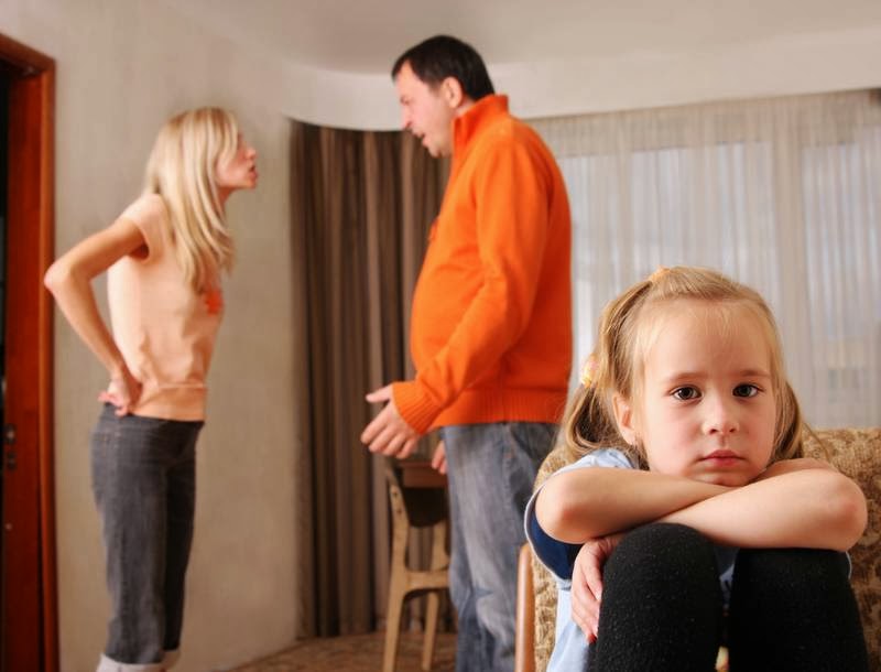 Parents arguing during divorce while child is sad