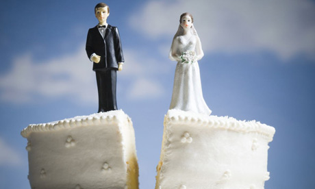 new york divorce attorney help needed due to marriage ending as shown by a wedding cake splitting