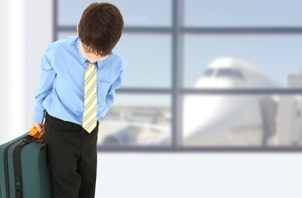child traveling in airport due to child custody visitation rights