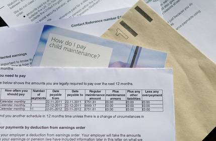Paperwork showing spousal support and child support payments